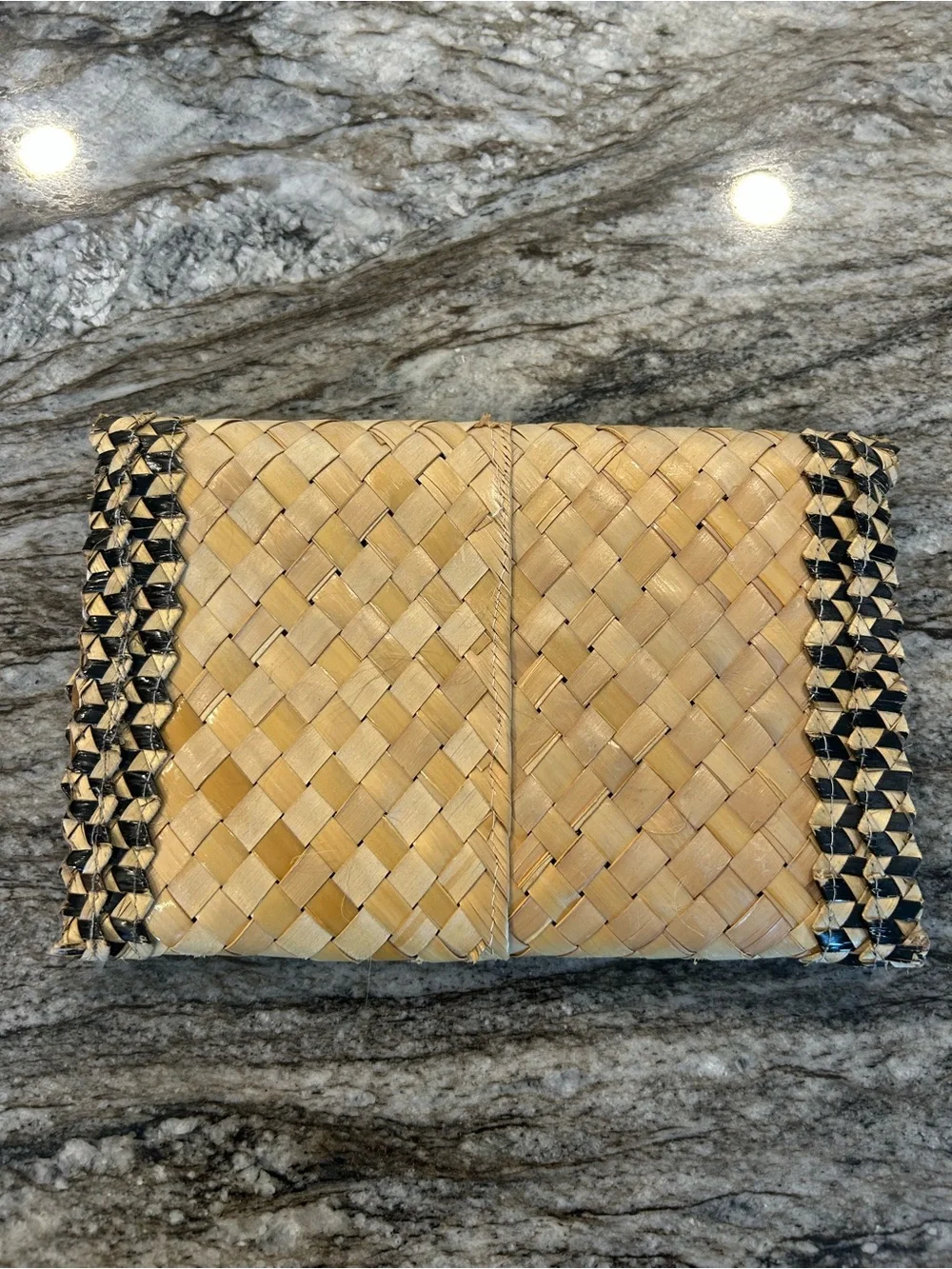 Handwoven Straw Clutch with Black Trim